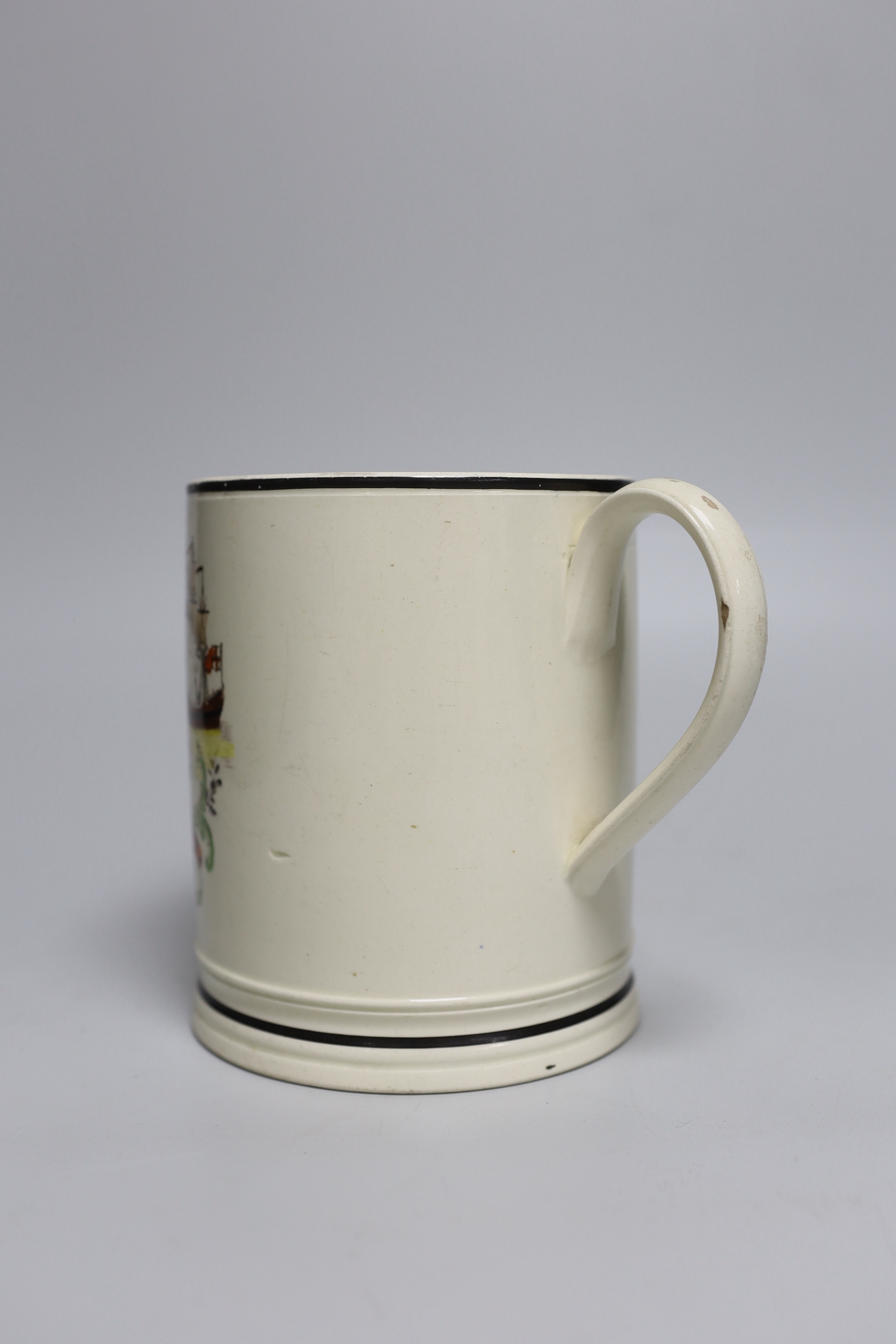 A rare late 18th century creamware cylindrical mug inscribed 'Success to Adml. Nelson’, 14cm high